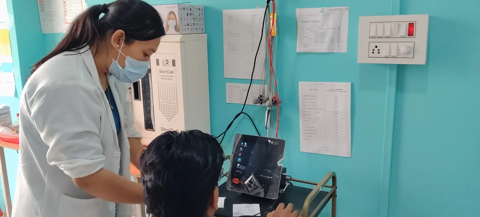 Doctor and patient inside eye clinic